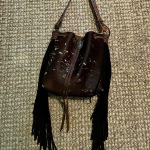 Cowhide fringe purse